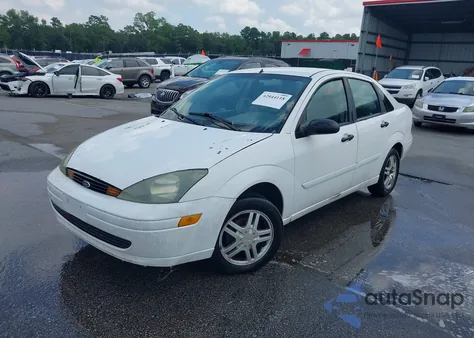 2004 Ford Focus Se z USA, uszkodzony, nr VIN 1FAFP34Z14W145170